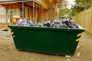 Clothes in a Skip Bin