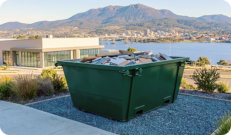Skip bin in Clarence Tasmania with local landscape view for residential and small business waste removal
